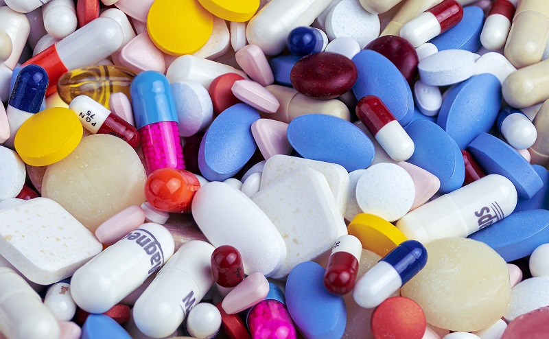 colorful pills and drugs (Myriam Zilles/Unsplash)