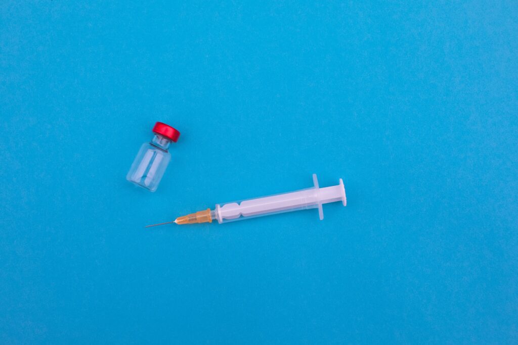 Empty syringe and vial