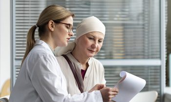 middle-aged-woman-with-skin-cancer-talking-with-her-doctor